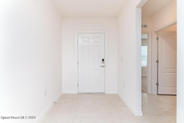 interior space with light tile patterned flooring