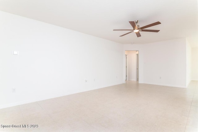 unfurnished room with ceiling fan