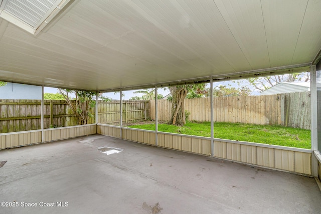 unfurnished sunroom with plenty of natural light