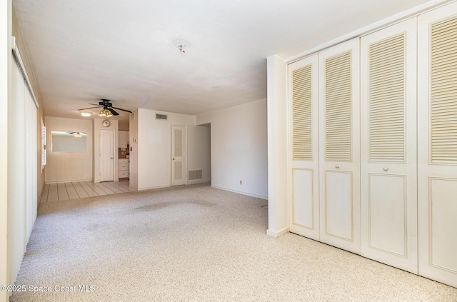 unfurnished bedroom with light carpet