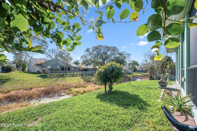 view of yard with a water view