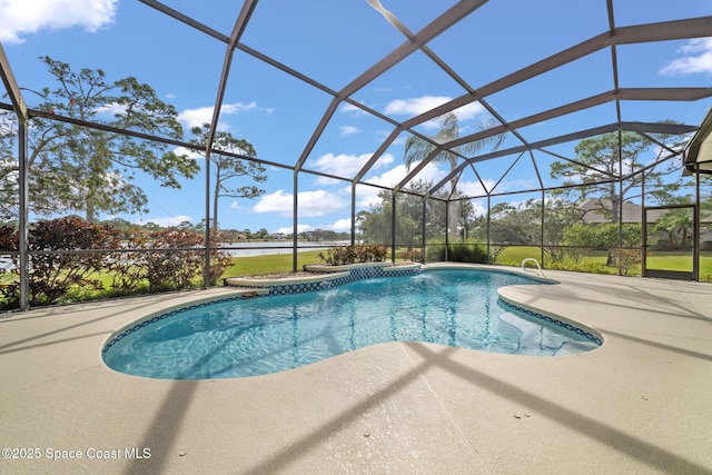 view of pool featuring a patio and glass enclosure