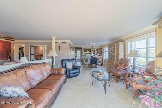 living room with light tile patterned flooring, ceiling fan, and crown molding