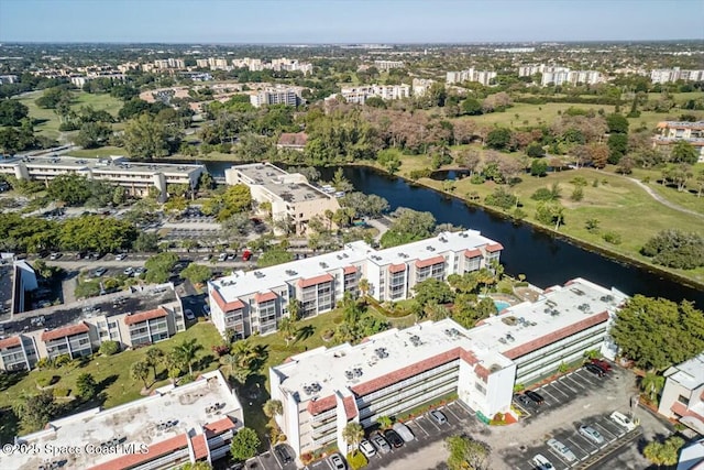 drone / aerial view featuring a water view