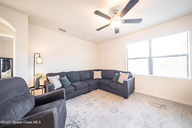 living room featuring ceiling fan