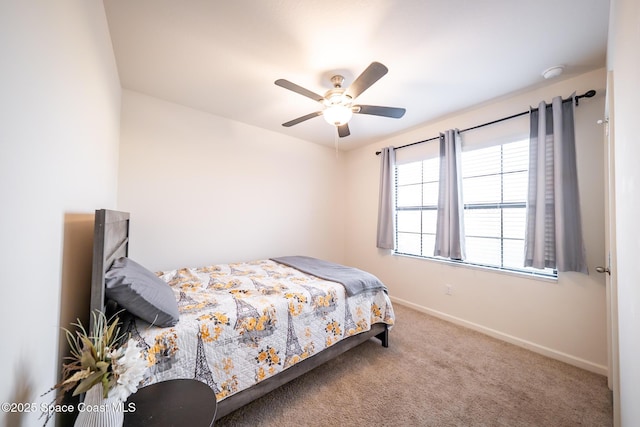 bedroom featuring ceiling fan and carpet flooring