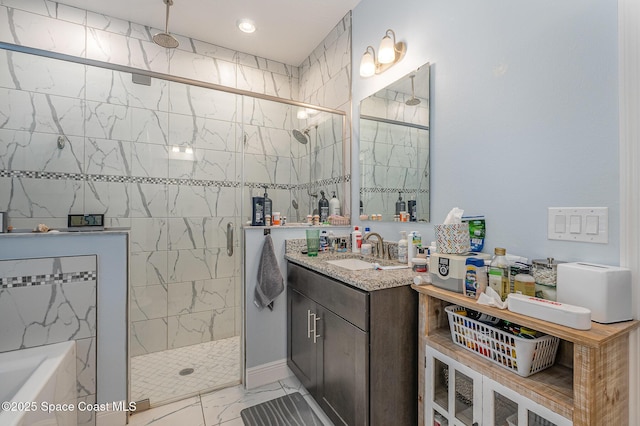 bathroom featuring vanity and walk in shower