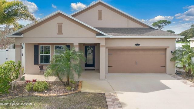 view of front of home featuring a garage