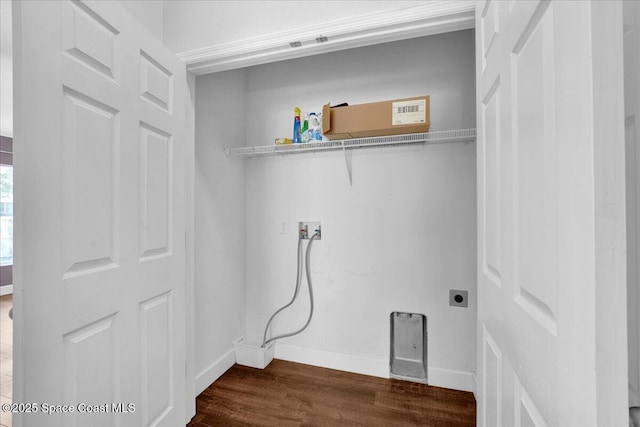 laundry room featuring hookup for an electric dryer, washer hookup, and dark hardwood / wood-style floors