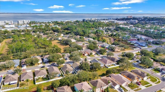 drone / aerial view with a water view