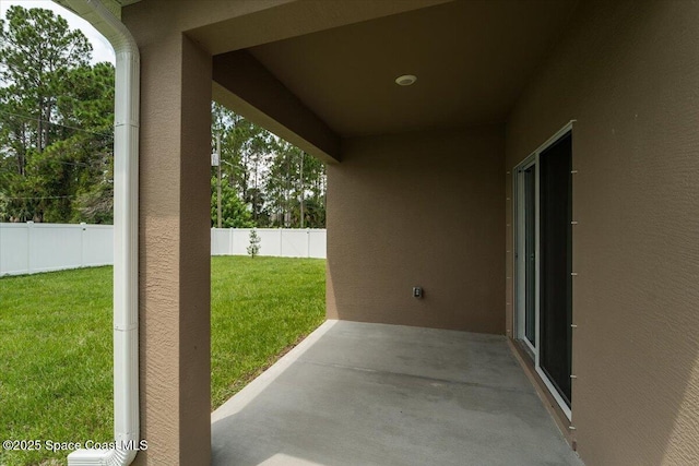 view of patio with fence