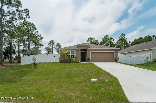 view of front of house with a garage, a front lawn, driveway, and fence