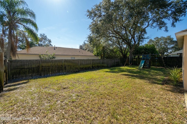 view of yard featuring a playground