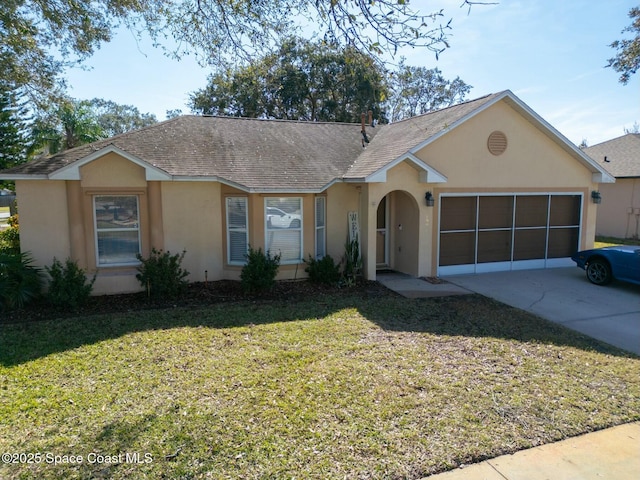 ranch-style house featuring a garage and a front yard