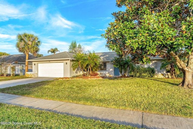 view of front of home with a garage and a front yard