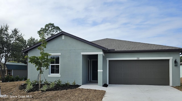 view of front of home featuring a garage