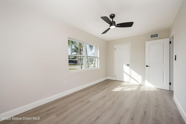 unfurnished bedroom featuring light hardwood / wood-style flooring and ceiling fan