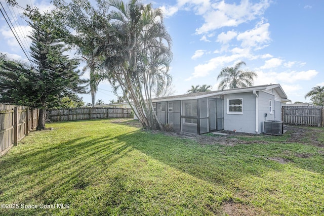 view of yard with a sunroom