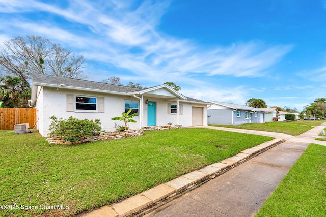 single story home with a garage, central AC unit, and a front lawn