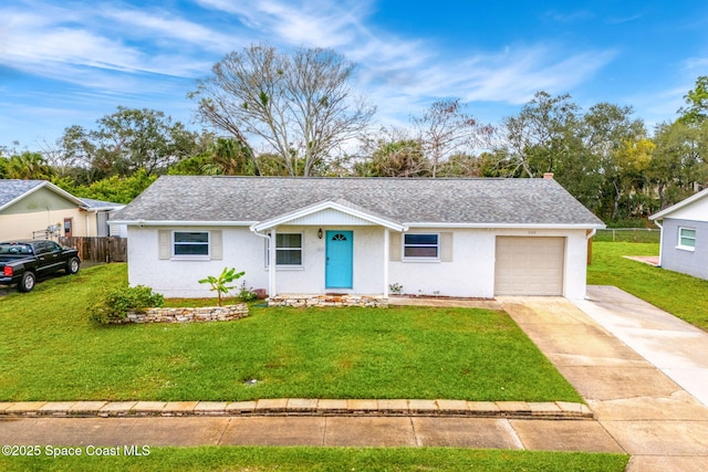 ranch-style house with a garage and a front yard