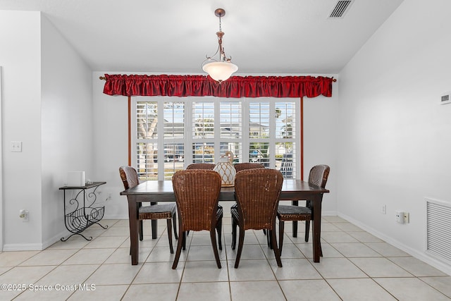 dining area with light tile patterned flooring