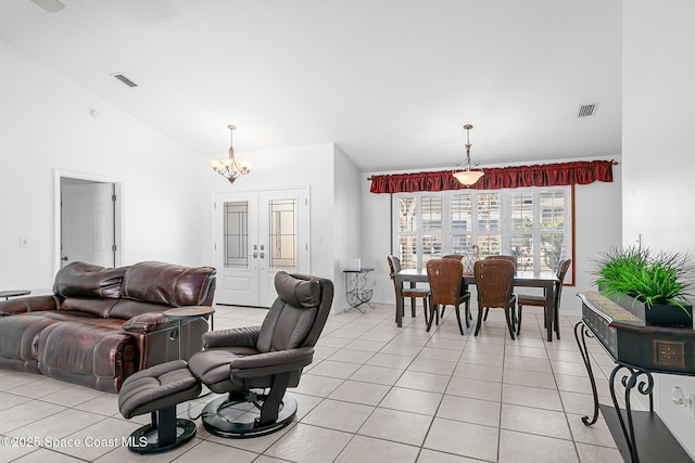 living room featuring french doors, a chandelier, high vaulted ceiling, and light tile patterned floors