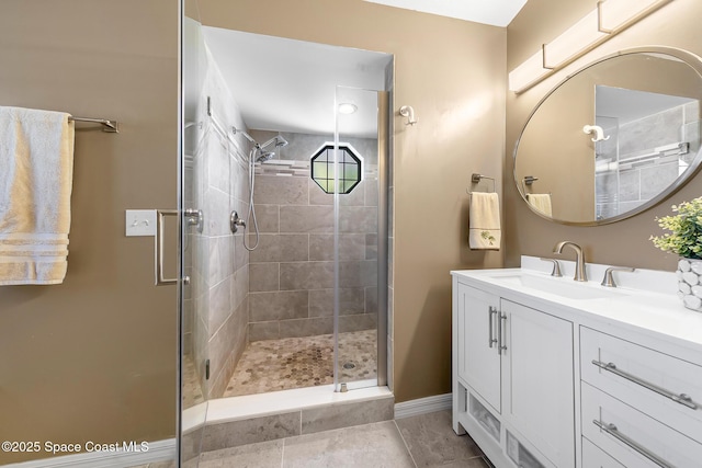 bathroom featuring vanity and walk in shower