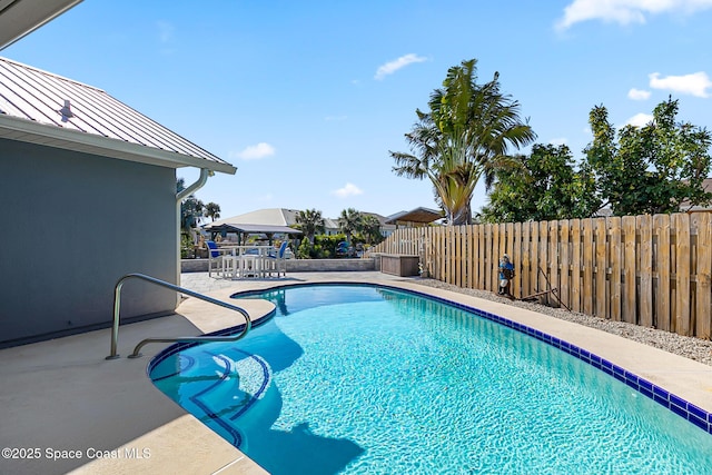 view of pool with a patio area