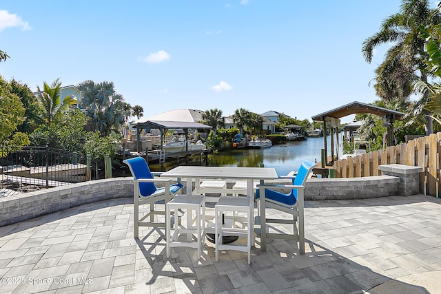 view of patio / terrace featuring a water view