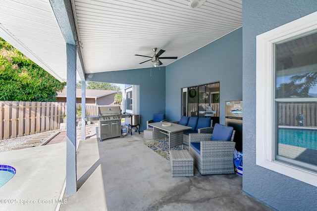 view of patio / terrace featuring an outdoor living space, area for grilling, and ceiling fan