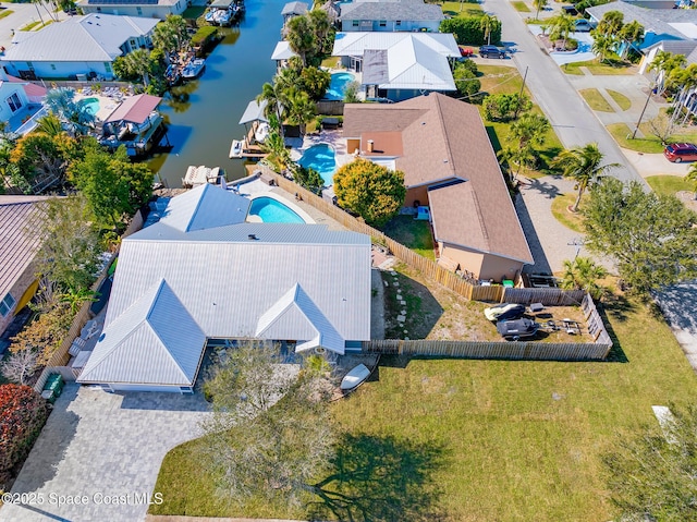 drone / aerial view with a water view