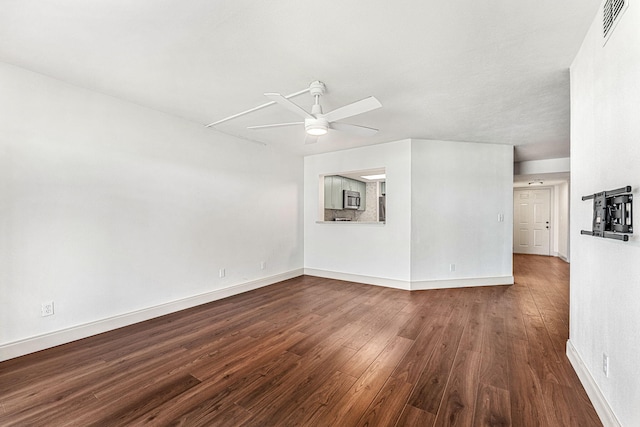 unfurnished living room with hardwood / wood-style floors and ceiling fan