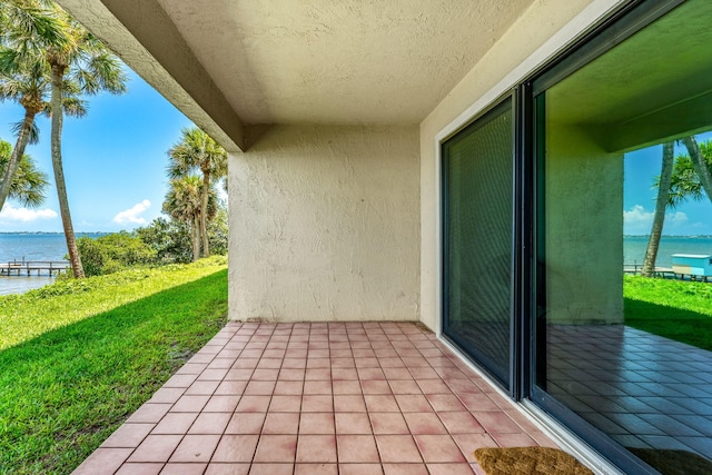 view of patio / terrace featuring a water view