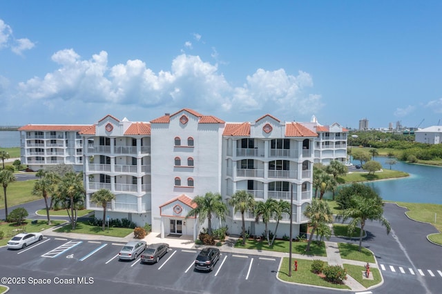 view of building exterior featuring a water view