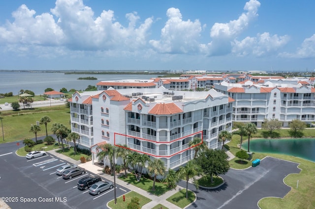 view of building exterior featuring a water view