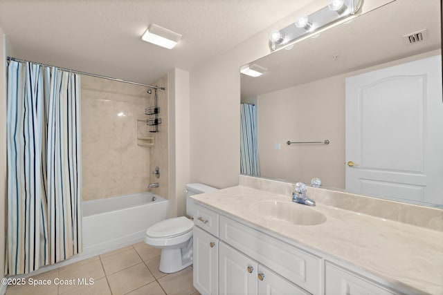 full bathroom with tile patterned flooring, vanity, toilet, shower / bathtub combination with curtain, and a textured ceiling