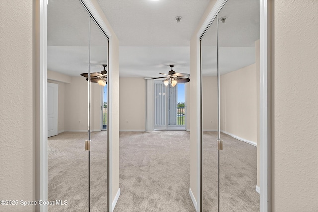 interior space featuring light colored carpet