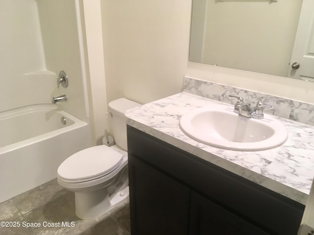 full bathroom with shower / tub combination, vanity, and toilet