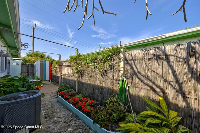 view of yard featuring central AC