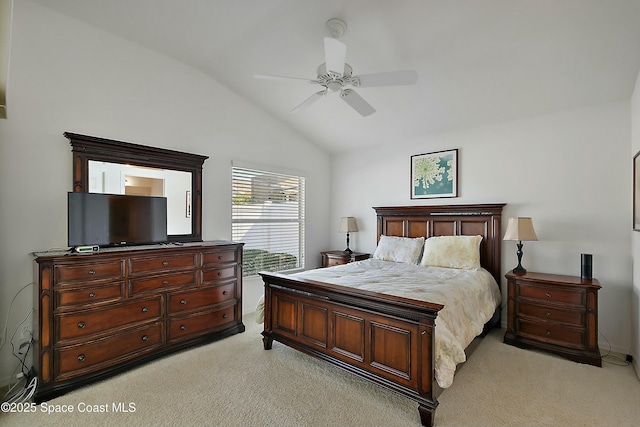 bedroom with lofted ceiling, light colored carpet, and ceiling fan