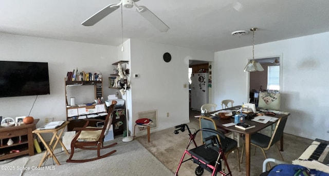 dining space with ceiling fan