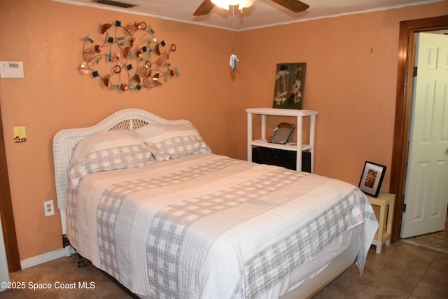 423 Longfellow Blvd, Lakeland, FL 33803 - tiled bedroom featuring crown molding and ceiling fan