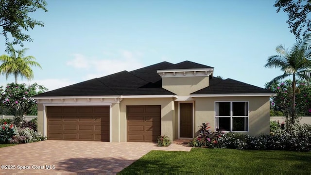 view of front facade featuring a garage and a front yard