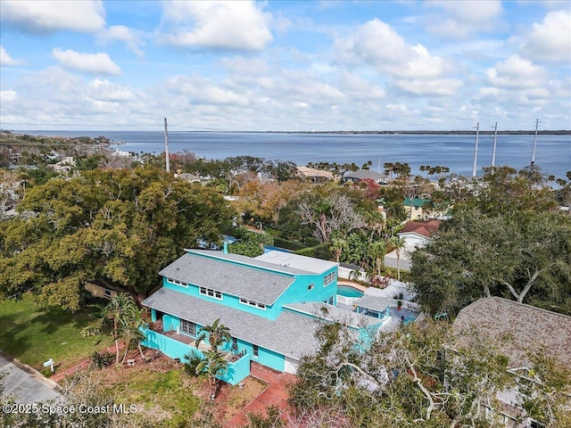 drone / aerial view with a water view