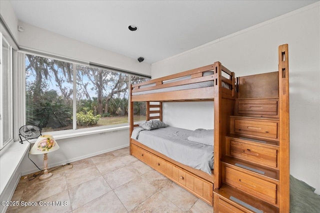 unfurnished bedroom with light tile patterned floors