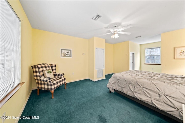 carpeted bedroom featuring ceiling fan