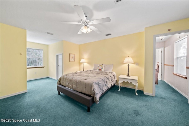 carpeted bedroom with ceiling fan