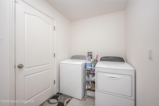 laundry room with washer and clothes dryer