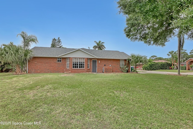 ranch-style home with a front yard