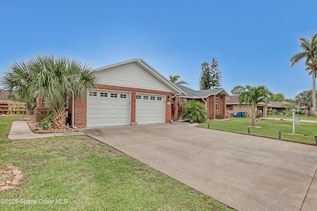 ranch-style house with a garage and a front lawn